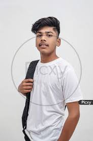 handsome indian young boy wearing white