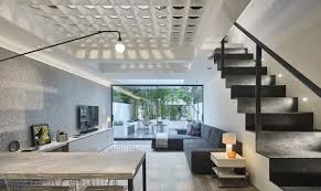 Photo 1 Of 11 In A London Townhouse Has Glass Circles In Its Floors To Filter In Ample Natural Light Dwell