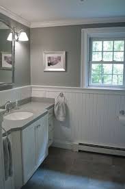 While the traditional height of a wainscoting design reaches up to 32, the average in bathrooms is extended to 36. New England Bathroom Design Custom By Pnb Porcelain Stone Look Tile White Beadboard Wainscot Beadboard Bathroom Small Bathroom Remodel New England Bathroom