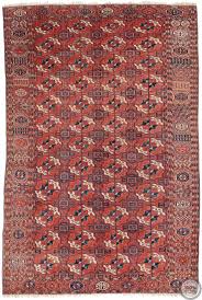 turkmen rug in red circa 1910 9 7 x 6 4
