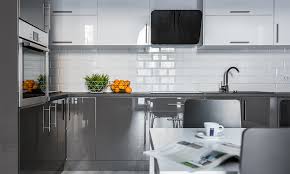 The overall classic look of the design is achieved with light quartz countertops and backsplashes. High Gloss Kitchen Cabinet Designs For Your Home Design Cafe