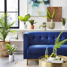 modern living room with faux greenery