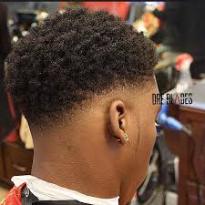 An afro fade is a haircut that is characterized by a gradual hair tapering, but it is more inventive and chic that other types of fade. Black Drop Fade With Design Novocom Top