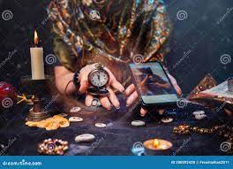 Magic and Online Fortune Telling. the Witch is Holding a Watch on a Chain  and a Smartphone Stock Photo - Image of communication, atmosphere: 200292428