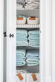 organize your linen closet beautifully