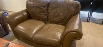 brown leather couch in melbourne region