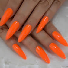 First up we have these neon coffin nails. Neon Orange Glue On Nails Long Length Stiletto Tips Nailsgaloreshop Com