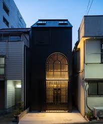 Narrow House With A Big Glass Door In Tokyo