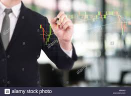 Business Person Touching Finance Stock Charts And Diagrams