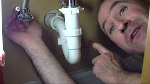fix a slow draining or clogged sink