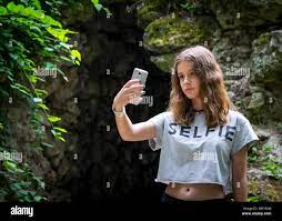 Teen girl selfie outdoors hi-res stock photography and images - Alamy