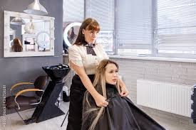 young woman professional hairdresser