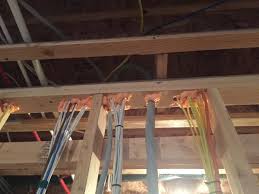 romex pulled too tight through joist