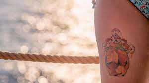 Tatouage cuisse : les meilleures idées de tattoos pour femme