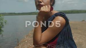 In a natural environment, a sensual woma... | Stock Video | Pond5