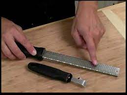 There are 5 sharp holes at the top and the middle has a very thin blade. Cooking Tips How To Use A Zester Youtube