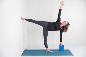 spinal rotation in half moon yogau