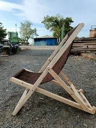 wooden folding chairs with armrest at