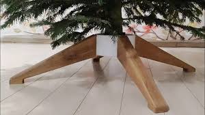 christmas tree stand made out of oak