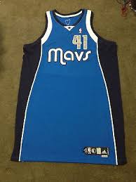 The mavs' association jersey includes mavs blue piping. Dirk Nowitzki Dallas Mavericks Game Worn 2009 10 Alternate Away Jersey 1074847593