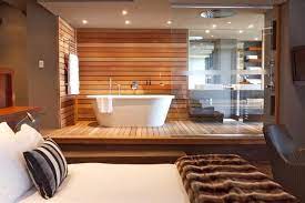 The bathroom opens via double doors that directly face the shower cubicle. 10 Open Plan Bedroom Bathroom Ideas Open Plan Bedroom And Bathroom Open Bathroom Bathroom Design