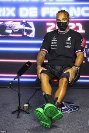 Lewis hamilton sported a pair of 12 hundred dollar bottega veneta chelsea boots with a black rubberized top and bright green sides, for the french grand prix. Lewis Hamilton Catches The Eye In A Pair Of 905 Bottega Boots As He Attends A Formula One Event Daily Mail Online