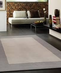 solid light beige area rug