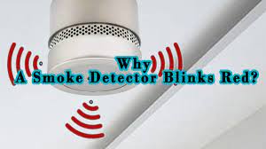 smoke detector blinks red