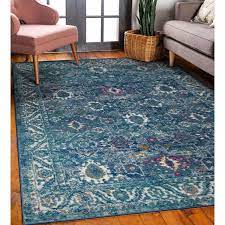 vine faded turquoise area rug