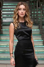 Laws suggested that the lip cuts. Amber Heard S Earthy Makeup And Smooth Curls Vogue