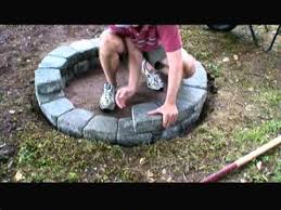 Remove the bricks and dig out the. How To Build A Fire Pit With Concrete Pavers Youtube