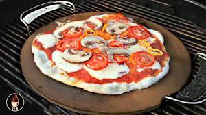 grilling pizza on the weber pizza stone