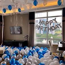 decorate the house with balloons