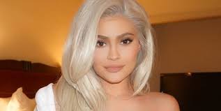 Young handsome blond business man wearing different outfits smiling with hands on chest with closed eyes and grateful. Kylie Jenner Got A Major Post Baby Hair Makeover Kylie Jenner Blonde Wig