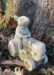 Rabbit On Tractor Stone Statue Bunny