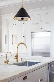 a stainless steel kitchen sink with an