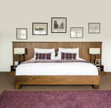 Black walnut, one of the most durable hardwoods, is prized for its dark color and straight grain. Walnut Bedroom Furniture Sloped Ceiling Wardrobes Neville Johnson