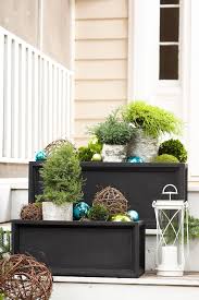 14 holiday planter ideas that will give