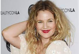 Drew Barrymore embraces the rain with innocent joy and fans have a lot