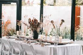 Wedding table decorated with flowers and dried flowers. Natural Natives Wedding Styled Shoot Tailrace Centre