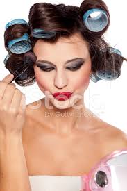 curlers and bad makeup applying blush