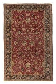 hand knotted antique hereke rug in red