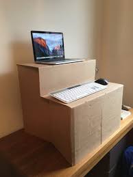 Adjustable desks are a great compromise that make it easier to heed physicians' suggestions to split your time between standing and sitting. Diy Standing Desk Make Your Own Cardboard Standing Desk Mac Standing Desks And Lifehacks Diy Standing Desk Diy Desk Standing Desk