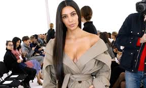 kim kardashian attends paris fashion