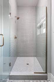Shower With Gray Glass Subway Tiles