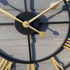 Black Skeleton Outdoor Clock With Gold