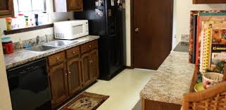 Here are a few tips if the existing layout is good, just reface the cabinet doors, don't forget the sides. Creating A High End Kitchen On A Shoestring Budget Today S Homeowner
