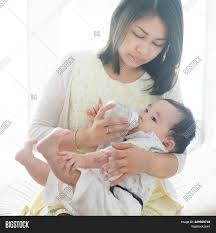 Mother Bottle Feed Image Photo Free Trial Bigstock