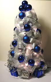Silver Blue And White Christmas Tree Made With Ribbon It