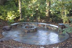 Stone Fire Pit With Flagstone Patio And